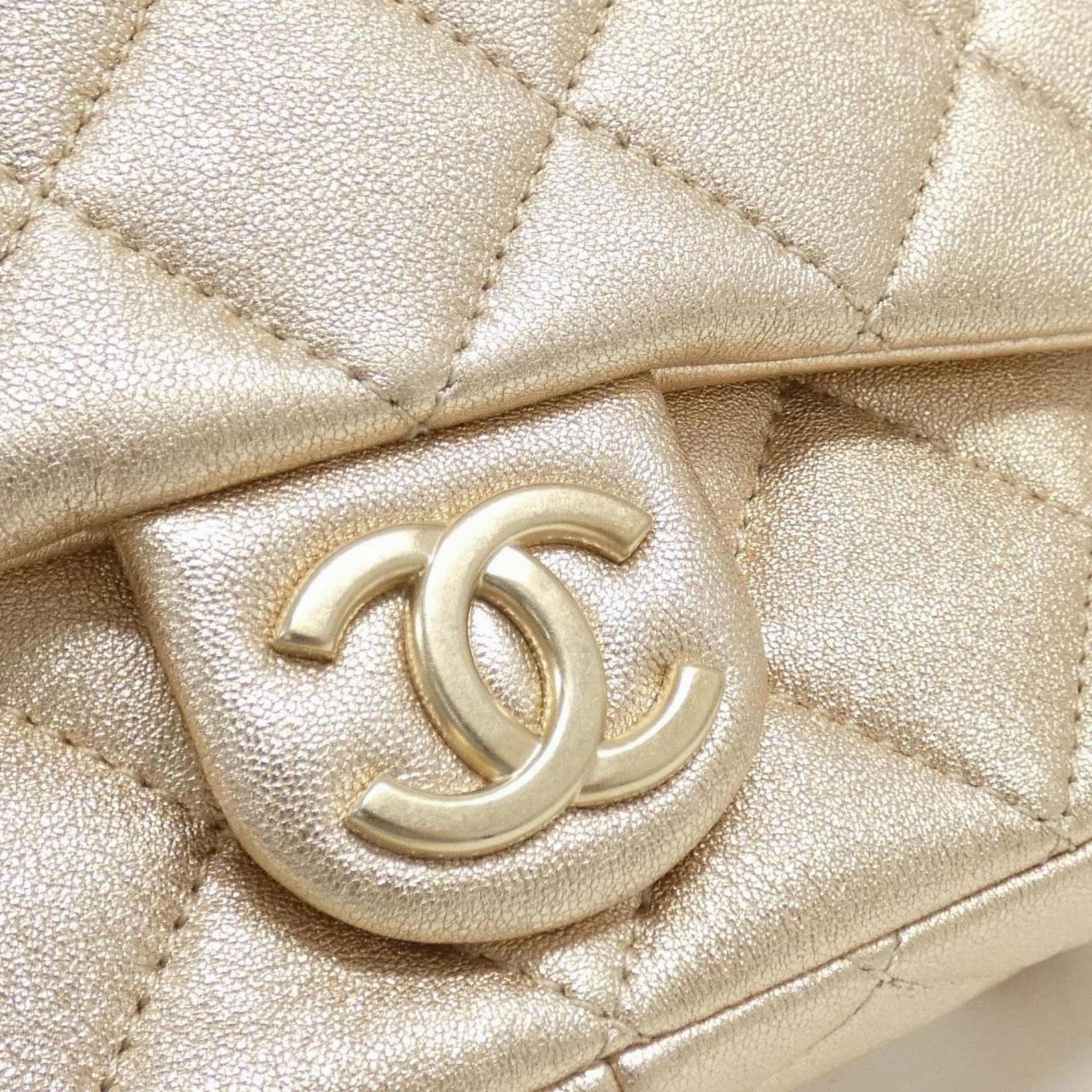 Chanel gold ivory Leather Backpack (Pre-Owned)