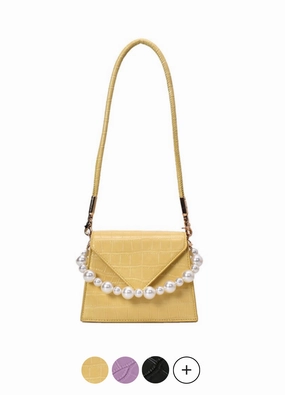 Conchita Handbags