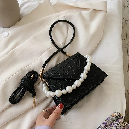 Conchita Handbags