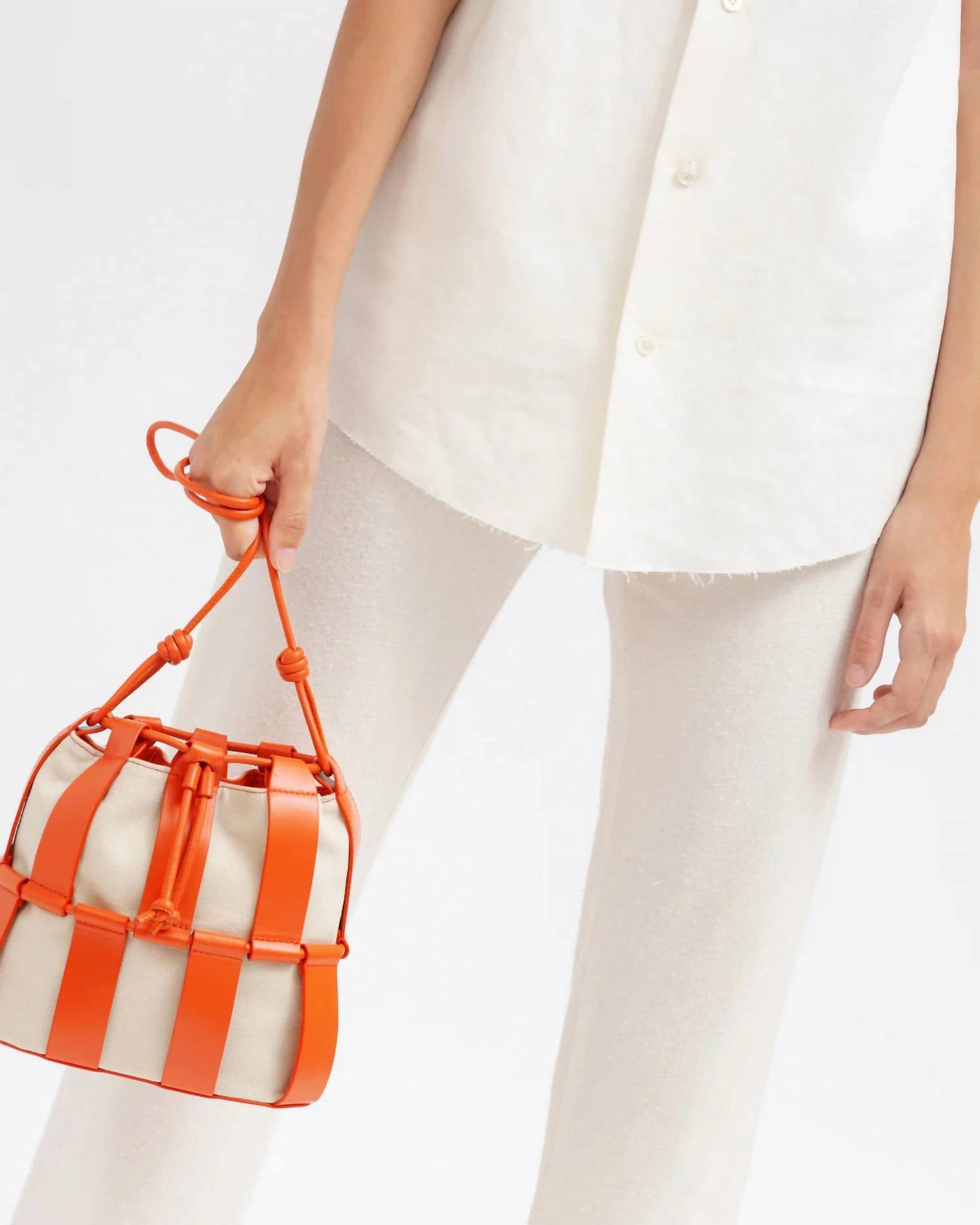 Llinera Drawstring Crossbody Bag In Ivory / Papaya