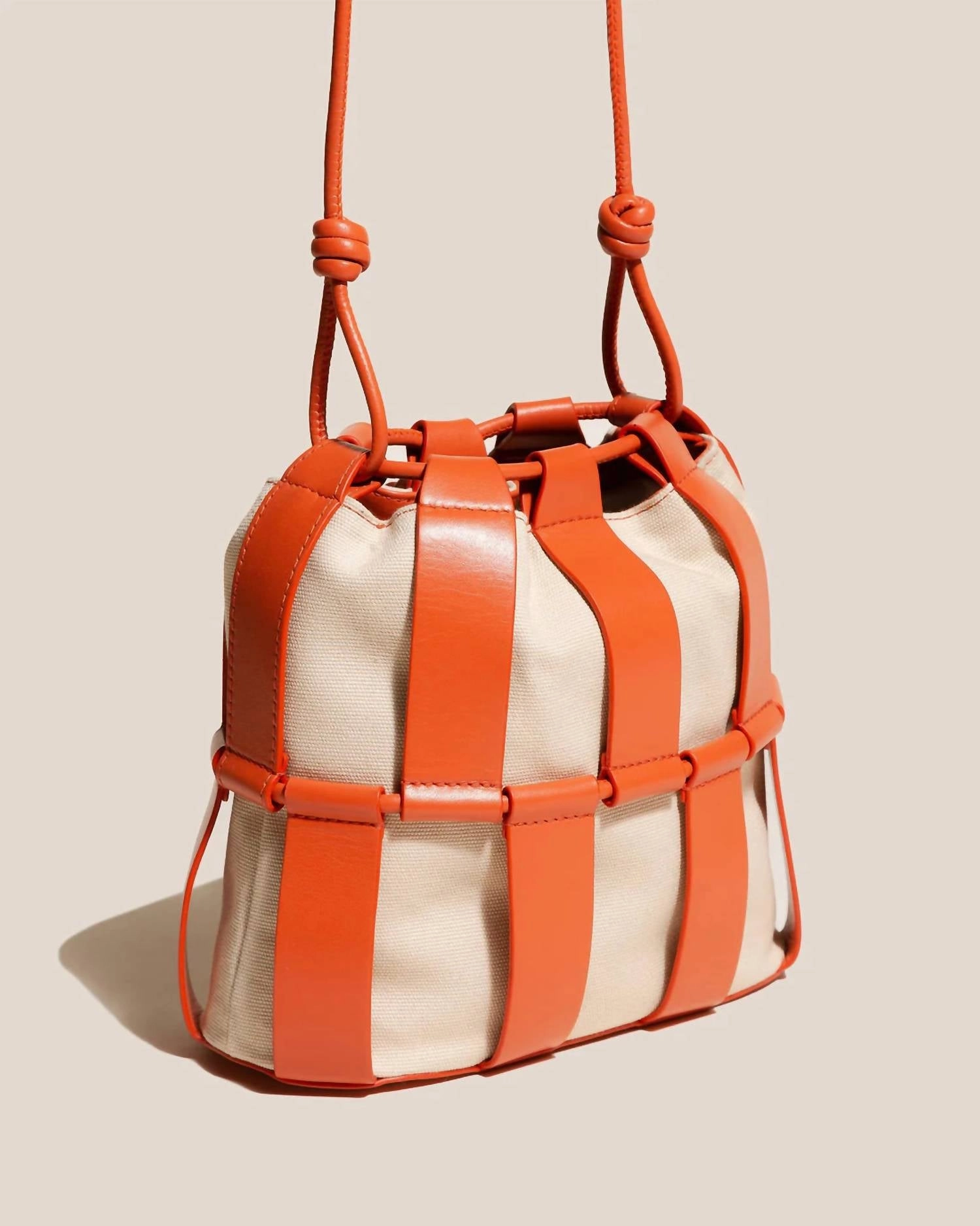 Llinera Drawstring Crossbody Bag In Ivory / Papaya
