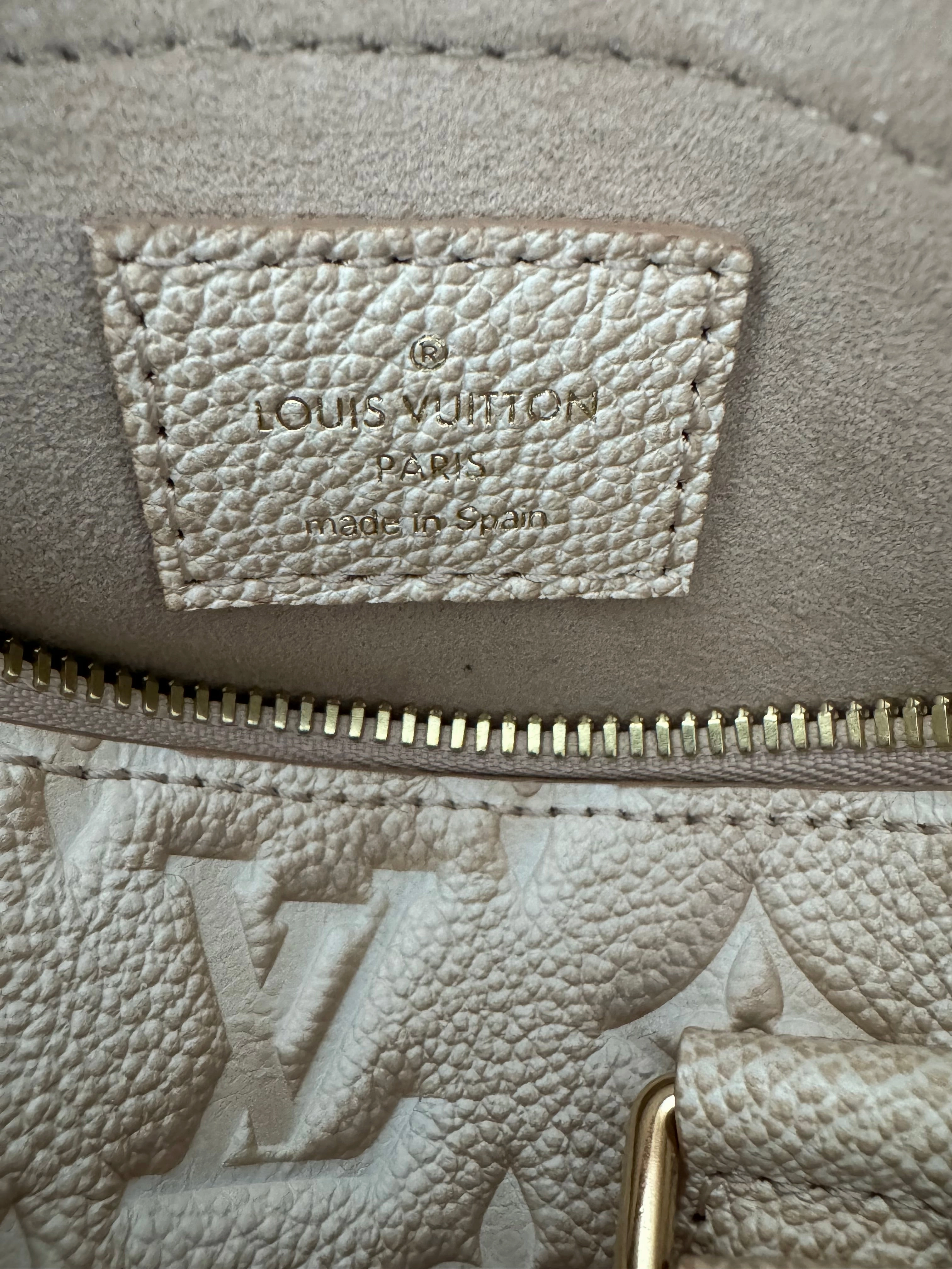 Louis Vuitton Stardust Beige Empreinte Monogram Speedy 20