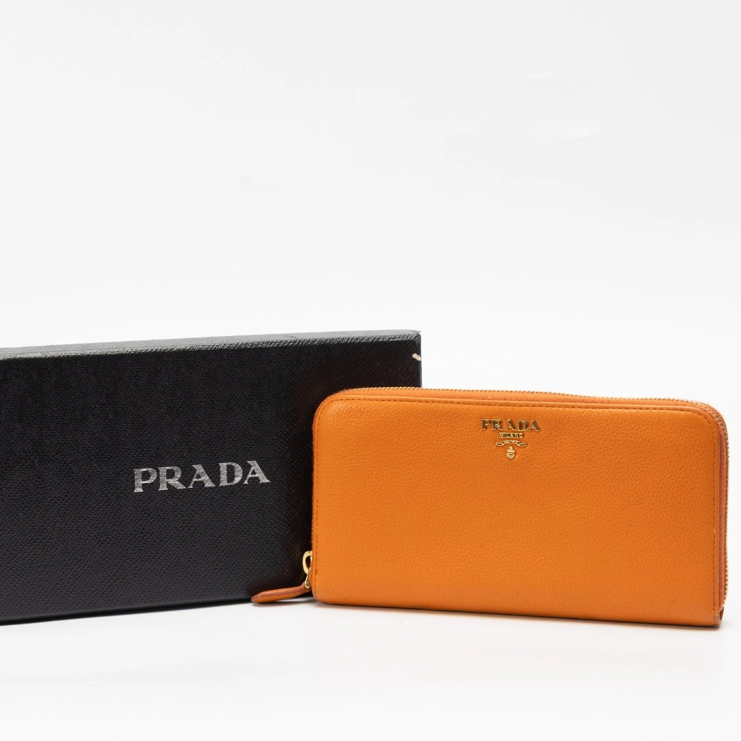 Prada Orange Pebbled Leather Zip Around Wallet