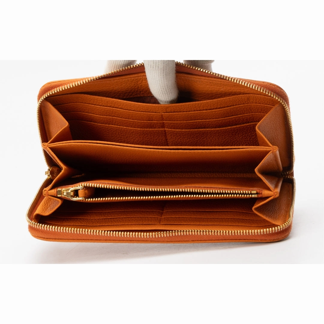 Prada Orange Pebbled Leather Zip Around Wallet