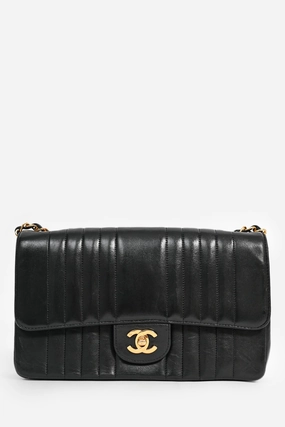Pre-Loved Chanel 1991-94 Vintage Black Vertical Quilted Lambskin Medium CC Flap Bag