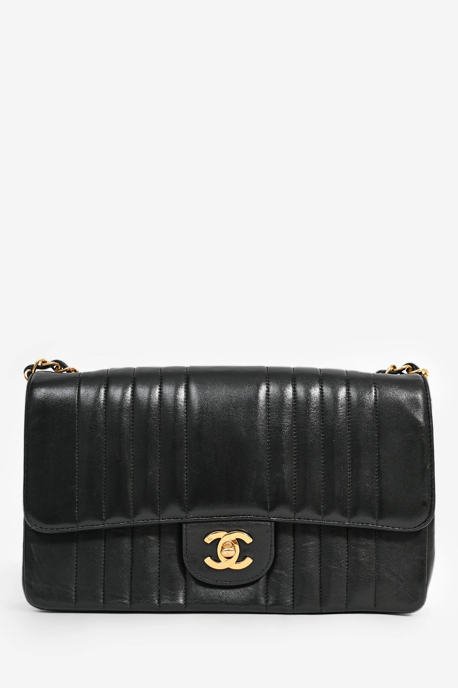 Pre-Loved Chanel 1991-94 Vintage Black Vertical Quilted Lambskin Medium CC Flap Bag