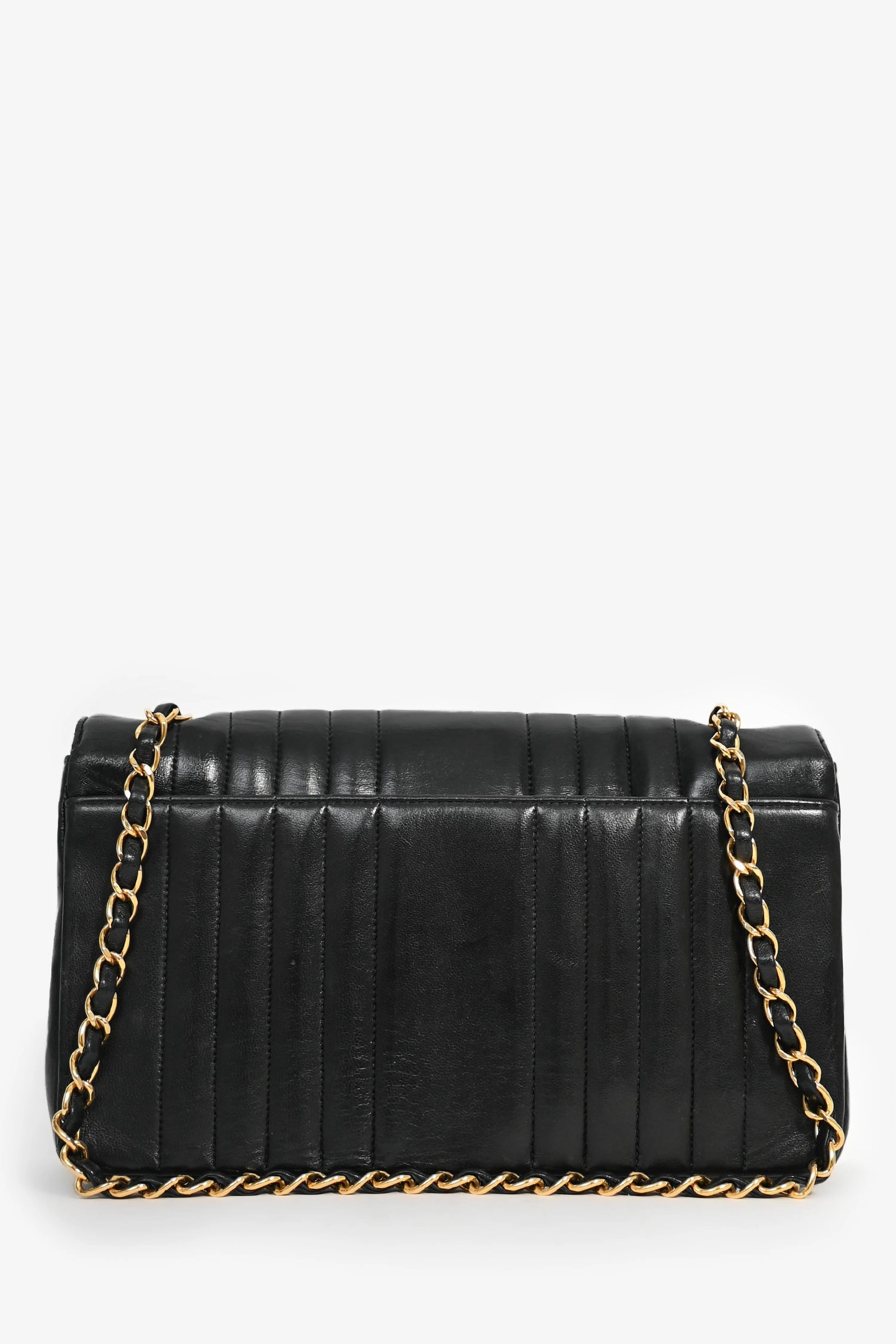 Pre-Loved Chanel 1991-94 Vintage Black Vertical Quilted Lambskin Medium CC Flap Bag