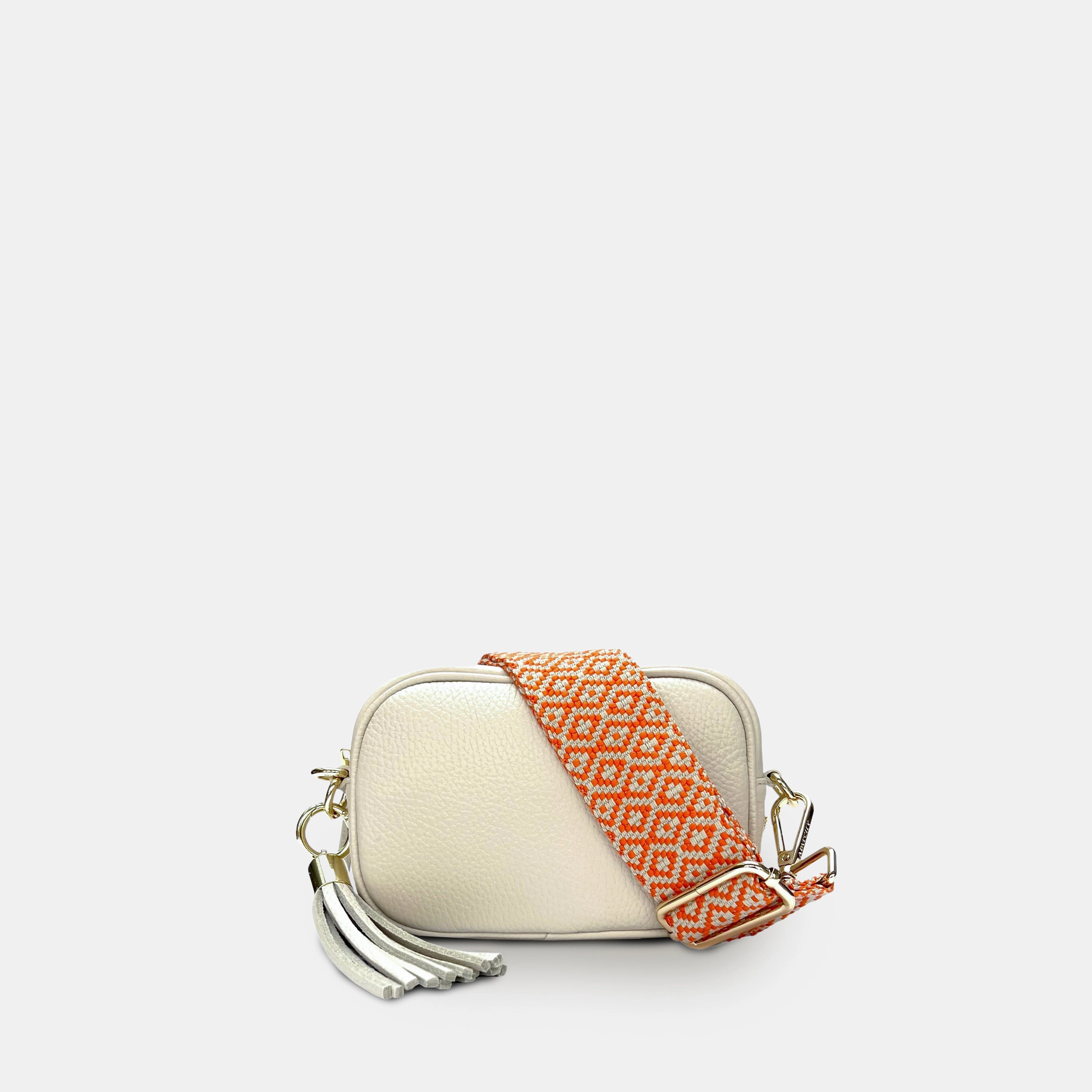 The Mini Tassel Stone Leather Phone Bag With Orange Cross-Stitch Strap