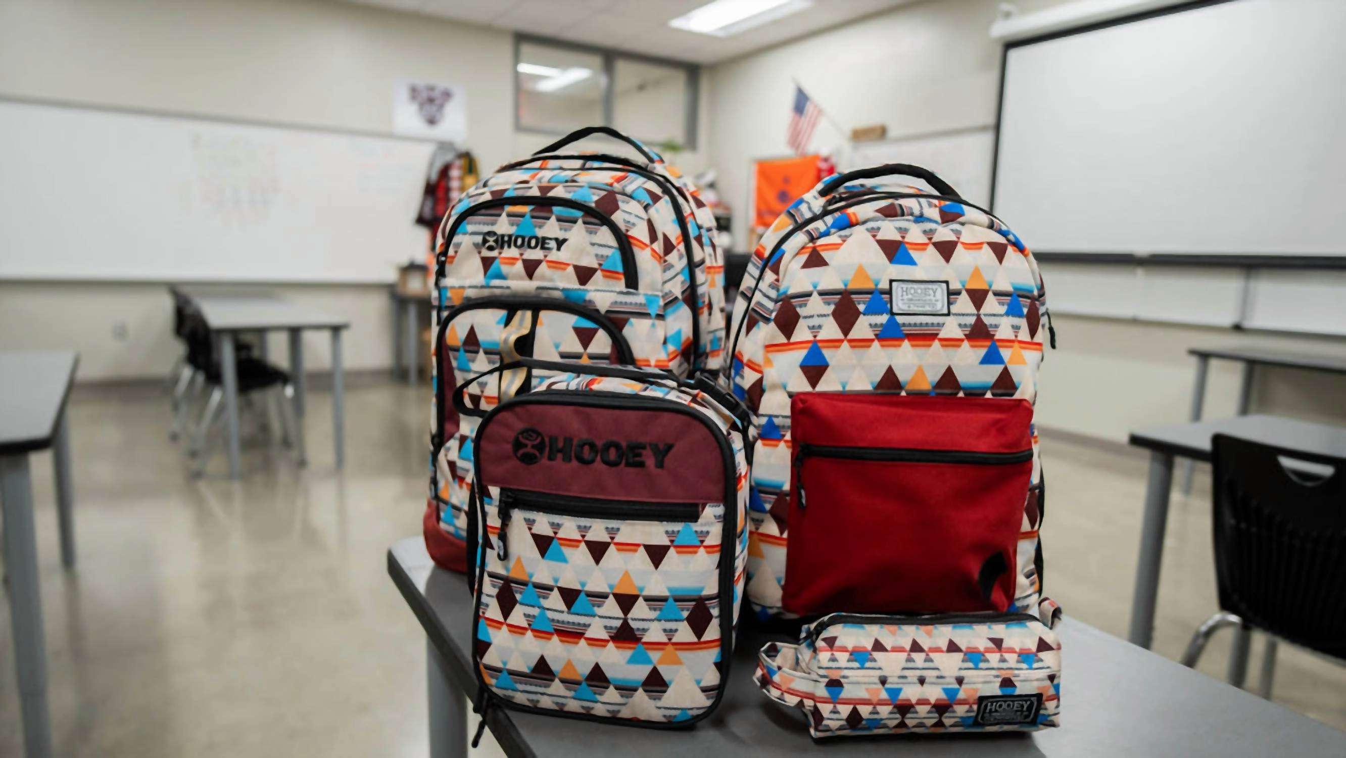 Unisex Recess Backpack In Cream/ Burgundy Aztec